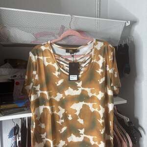 Lucky & Blessed Cow Print Tee